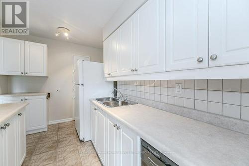 803 - 1964 Main Street W, Hamilton, ON - Indoor Photo Showing Kitchen With Double Sink