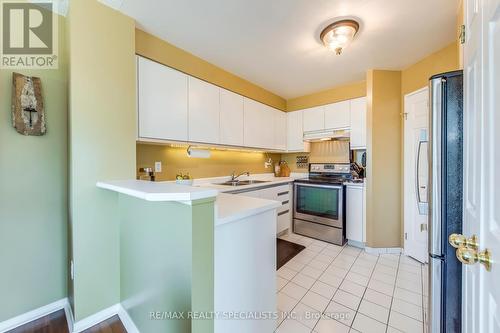 404 - 2177 Burnhamthorpe Road W, Mississauga (Erin Mills), ON - Indoor Photo Showing Kitchen With Double Sink