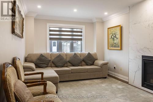 112 Braidwood Lake Road, Brampton, ON - Indoor Photo Showing Living Room With Fireplace