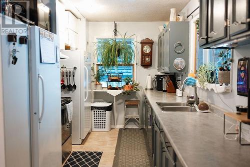 9680 Chilcotin Road, Prince George, BC - Indoor Photo Showing Kitchen With Double Sink