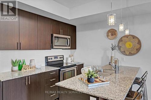 103 - 1210 Main Street E, Milton (Dempsey), ON - Indoor Photo Showing Kitchen With Double Sink With Upgraded Kitchen