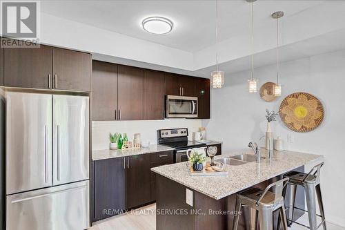 103 - 1210 Main Street E, Milton (Dempsey), ON - Indoor Photo Showing Kitchen With Double Sink With Upgraded Kitchen