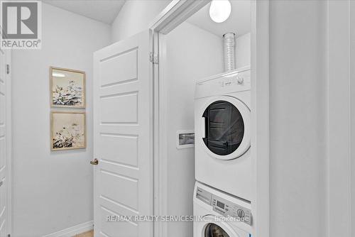 103 - 1210 Main Street E, Milton (Dempsey), ON - Indoor Photo Showing Laundry Room