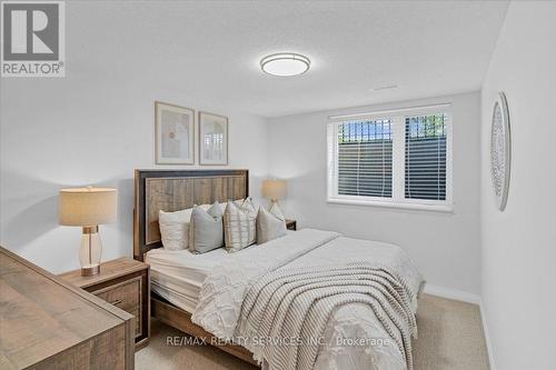 103 - 1210 Main Street E, Milton (Dempsey), ON - Indoor Photo Showing Bedroom