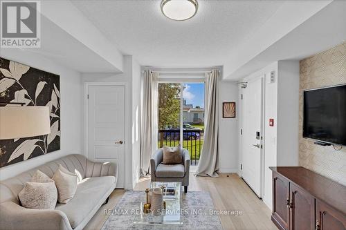 103 - 1210 Main Street E, Milton (Dempsey), ON - Indoor Photo Showing Living Room