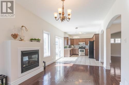 553 Carriage Lane, Peterborough, ON - Indoor Photo Showing Living Room With Fireplace