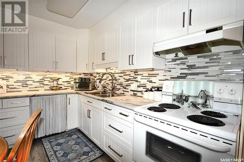 202 1 26Th Street E, Prince Albert, SK - Indoor Photo Showing Kitchen With Double Sink