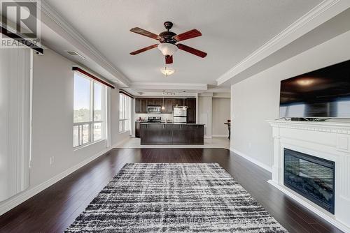 410 - 1030 Coronation Drive, London, ON - Indoor Photo Showing Living Room With Fireplace