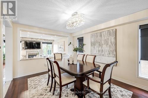 26 Porchlight Road, Brampton, ON - Indoor Photo Showing Dining Room With Fireplace