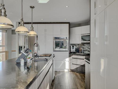 Cuisine - 1000 Rue Des Tournesols, Sainte-Adèle, QC - Indoor Photo Showing Kitchen With Double Sink With Upgraded Kitchen