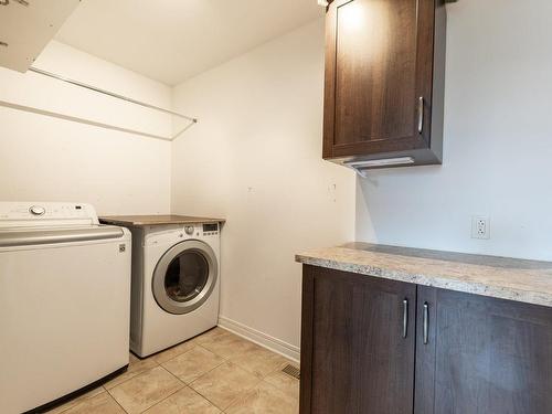 Salle de lavage - 18 Rue Ravel, Saint-Jean-Sur-Richelieu, QC - Indoor Photo Showing Laundry Room