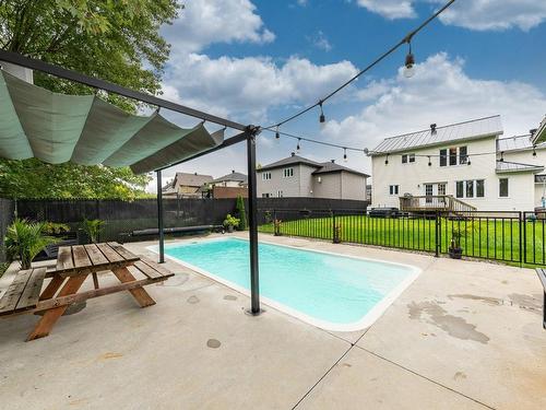 Piscine - 18 Rue Ravel, Saint-Jean-Sur-Richelieu, QC - Outdoor With In Ground Pool With Backyard