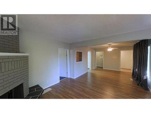 690 Carney Street, Prince George, BC - Indoor Photo Showing Other Room With Fireplace