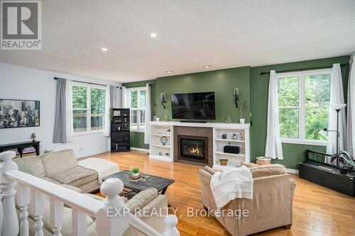 34 Taylor Drive, Prince Edward County (Ameliasburgh), ON - Indoor Photo Showing Living Room With Fireplace