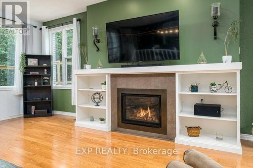 34 Taylor Drive, Prince Edward County (Ameliasburgh), ON - Indoor Photo Showing Living Room With Fireplace