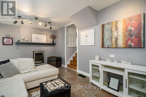 34 Taylor Drive, Prince Edward County (Ameliasburgh), ON - Indoor Photo Showing Living Room With Fireplace