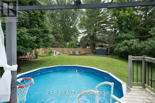 34 Taylor Drive, Prince Edward County (Ameliasburgh), ON - Outdoor With Above Ground Pool With Backyard