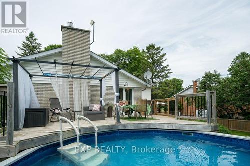 34 Taylor Drive, Prince Edward County (Ameliasburgh), ON - Outdoor With Above Ground Pool With Deck Patio Veranda