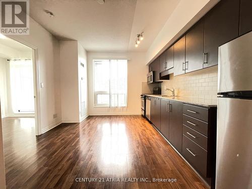 1504 - 30 Herons Hill Way, Toronto, ON - Indoor Photo Showing Kitchen