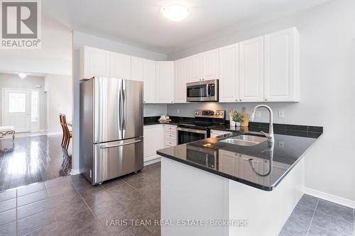 8 Orleans Avenue, Barrie (Innis-Shore), ON - Indoor Photo Showing Kitchen With Double Sink