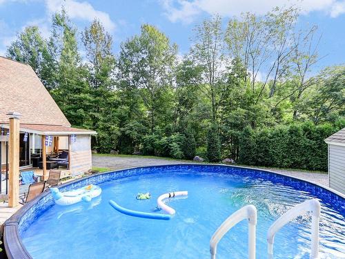 Piscine - 1389 Ch. De Val-Des-Lacs, Sainte-Sophie, QC - Outdoor With Above Ground Pool With Backyard