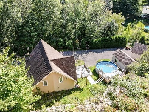 Photo aÃ©rienne - 1389 Ch. De Val-Des-Lacs, Sainte-Sophie, QC - Outdoor With Above Ground Pool