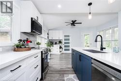 kitchen view to dining nook and door to deck - 