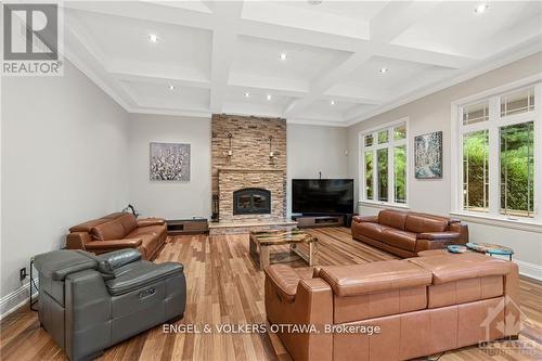 5800 Queenscourt Crescent, Ottawa, ON - Indoor Photo Showing Living Room With Fireplace