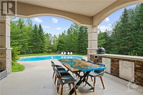 5800 Queenscourt Crescent, Ottawa, ON - Outdoor With In Ground Pool With Exterior