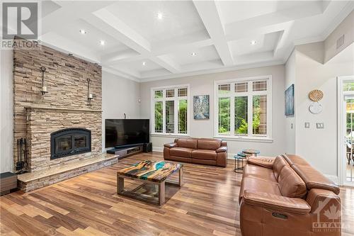 5800 Queenscourt Crescent, Ottawa, ON - Indoor Photo Showing Living Room With Fireplace