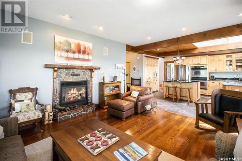 12 Watson Bay, Mckillop Rm No. 220, SK - Indoor Photo Showing Living Room With Fireplace