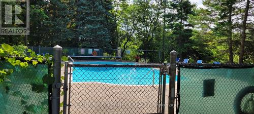 1213 - 4725 Sheppard Avenue E, Toronto (Agincourt South-Malvern West), ON - Outdoor With In Ground Pool