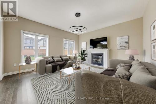 122 Ambrous Crescent, Guelph (Village), ON - Indoor Photo Showing Living Room With Fireplace