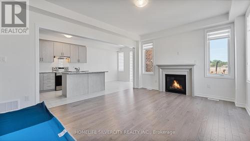 1 Molnar Crescent, Brantford, ON - Indoor Photo Showing Living Room With Fireplace