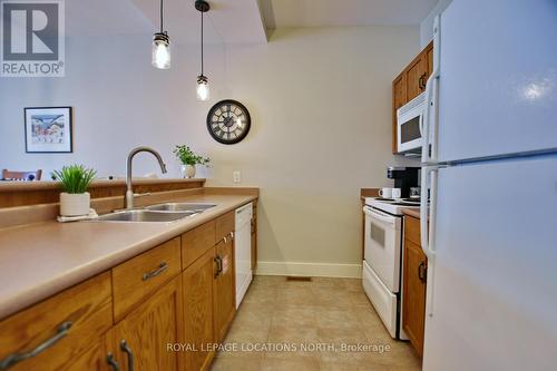 117 - 125 Fairway Court, Blue Mountains (Blue Mountain Resort Area), ON - Indoor Photo Showing Kitchen With Double Sink