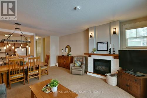 117 - 125 Fairway Court, Blue Mountains (Blue Mountain Resort Area), ON - Indoor With Fireplace