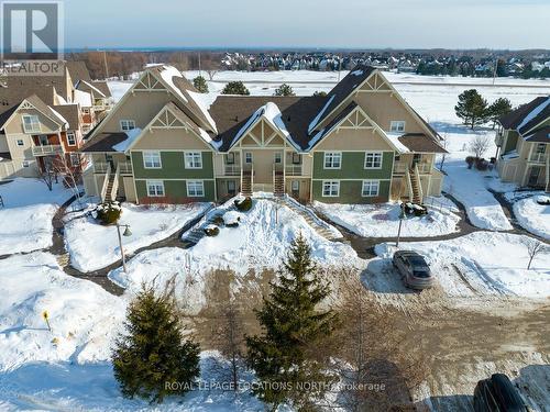 117 - 125 Fairway Court, Blue Mountains, ON - Outdoor With Facade