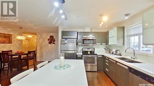 105 1545 Neville Drive, Regina, SK - Indoor Photo Showing Kitchen With Double Sink With Upgraded Kitchen