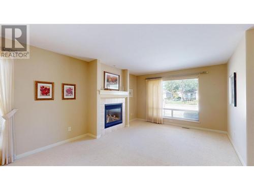 2365 Stillingfleet Road Unit# 10, Kelowna, BC - Indoor With Fireplace