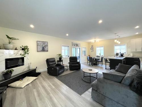 1916 Fort Sheppard Drive, Nelson, BC - Indoor Photo Showing Living Room With Fireplace