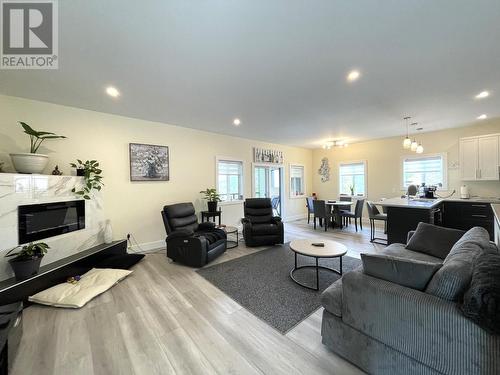 1916 Fort Sheppard  Drive, Nelson, BC - Indoor Photo Showing Living Room With Fireplace