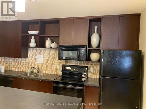 508 - 80 Port Street E, Mississauga (Port Credit), ON - Indoor Photo Showing Kitchen With Double Sink