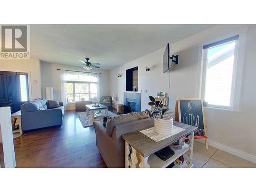 10503 114A Avenue, Fort St. John, BC - Indoor Photo Showing Living Room With Fireplace