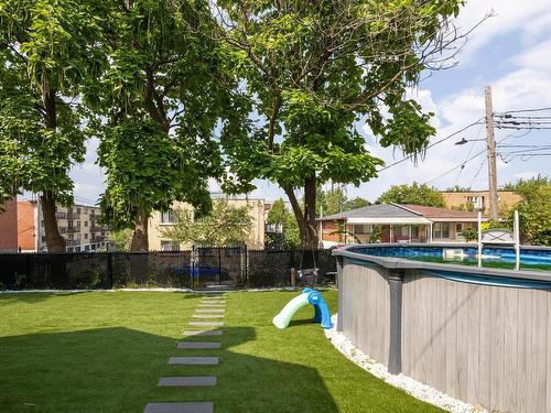 Cour - 11285 Av. Garon, Montréal (Montréal-Nord), QC - Outdoor With Above Ground Pool With Backyard