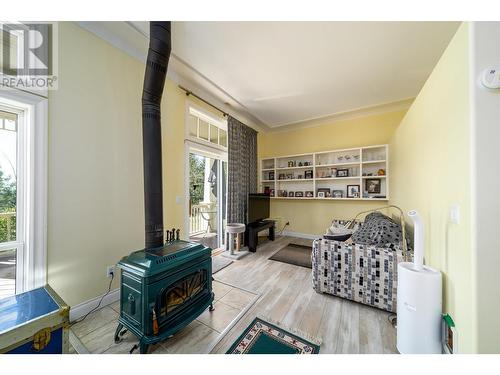 1577 Boone Court, Kelowna, BC - Indoor With Fireplace