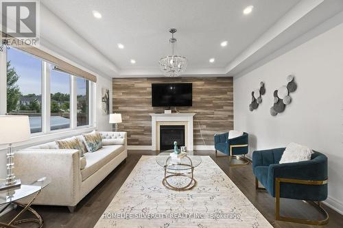 56 Fieldstone Ln Avenue, Caledon, ON - Indoor Photo Showing Living Room With Fireplace