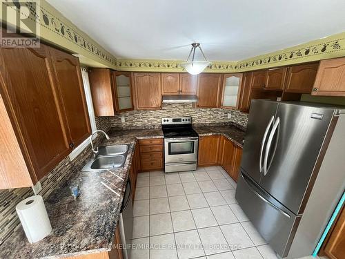 Main - 243 Queen Mary Drive, Brampton, ON - Indoor Photo Showing Kitchen With Double Sink