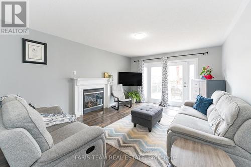 4 Callander Crescent, New Tecumseth (Alliston), ON - Indoor Photo Showing Living Room With Fireplace