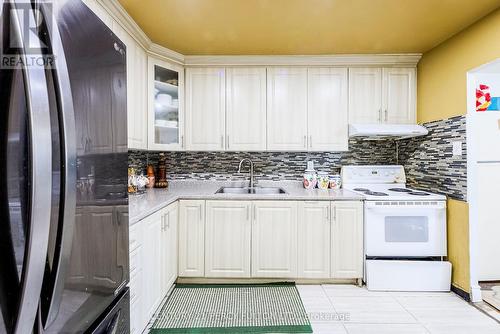 104 - 3555 Derry Road, Mississauga, ON - Indoor Photo Showing Kitchen With Double Sink