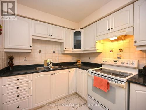 119 - 120 Collins Crescent W, Brampton, ON - Indoor Photo Showing Kitchen With Double Sink